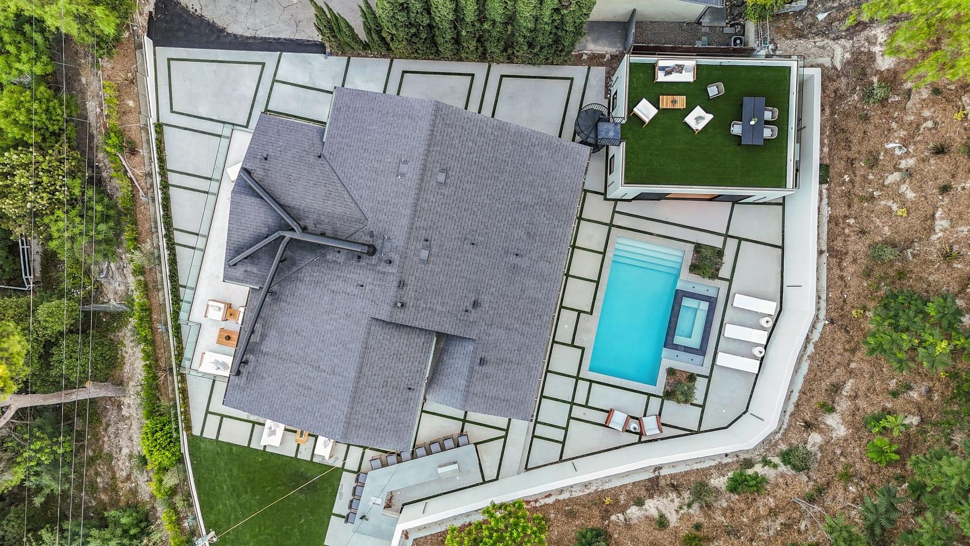 Overhead aerial of the pool and lawn at an Encino hillside residence